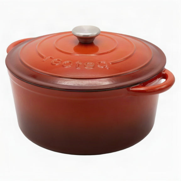 Red enameled cast iron Dutch oven with a lid on a white background